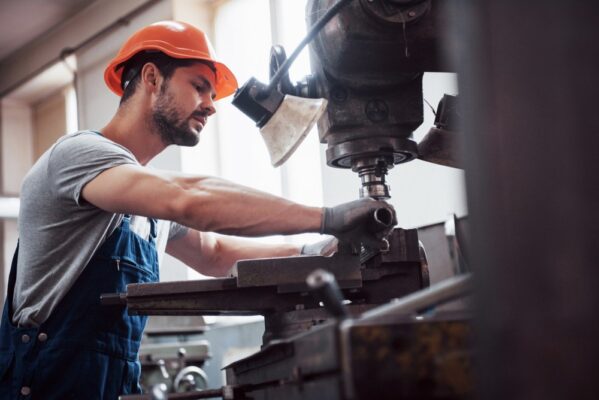 An engineer operating a machine