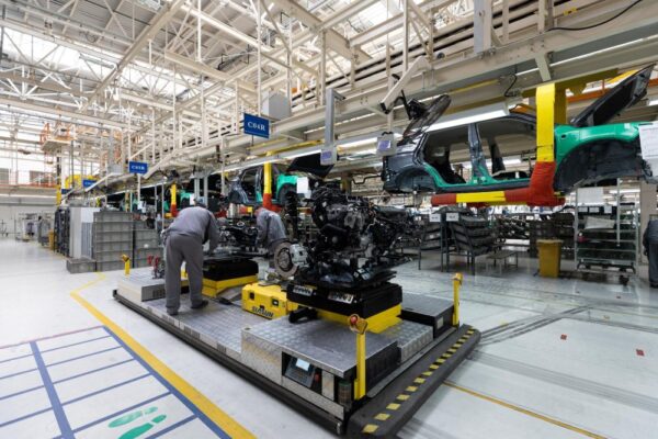 Workers in a car manufacturing plant